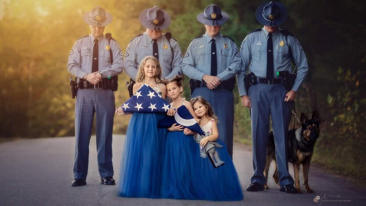 The daughters of fallen S.C. trooper Daniel Rebman — from left, Olivia, Charlee and Kennedy — used some of his possession in a photo shoot to memorialize their father and also show what law enforcement officers have to lose when they leave home to go on patrol.