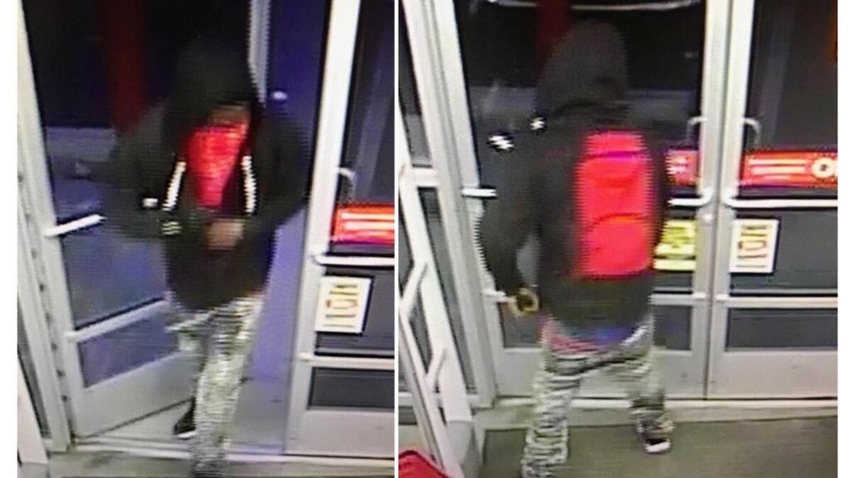 Surveillance photos at the Family Dollar at 5304 Fairfield Road around 6:30 PM, February 21, 2017