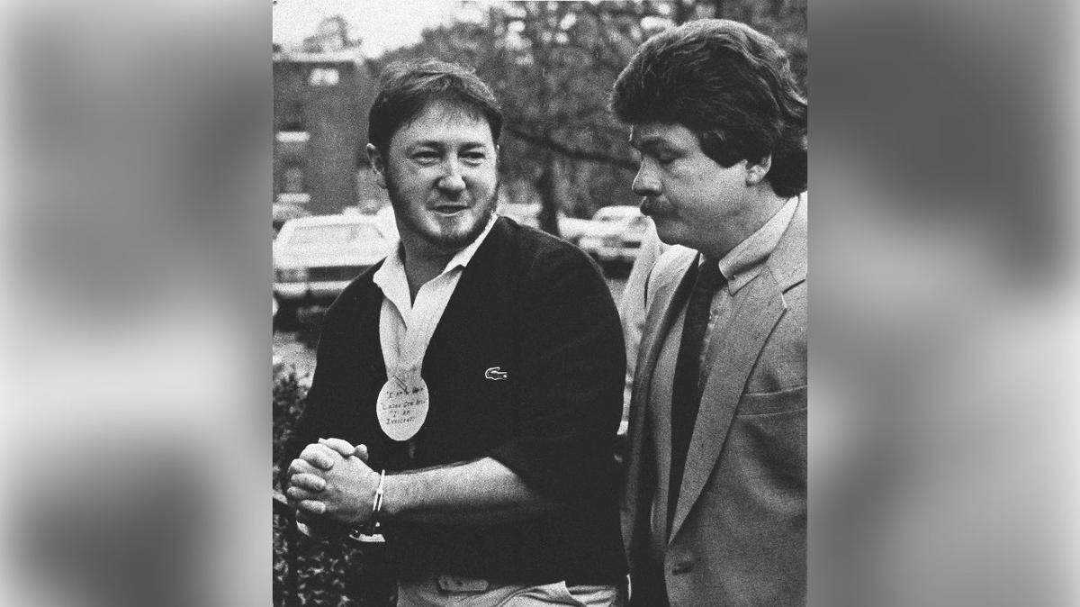 Larry Gene Bell, left, arrives at the Berkeley County courthouse on Feb.11, 1986, for his trial on charges of murder and kidnapping in the 1985 slaying of Lexington County teenager Shari Faye Smith.