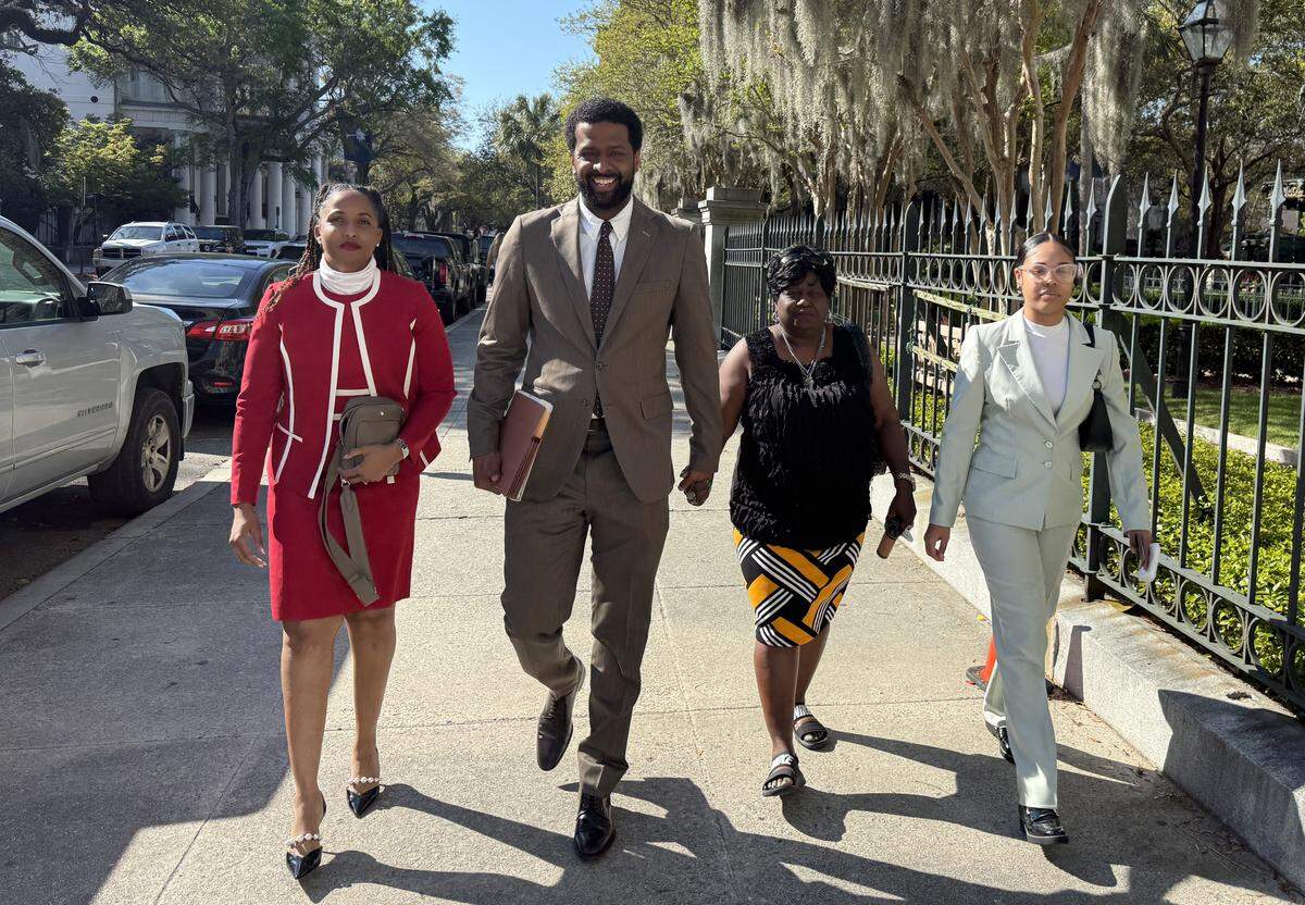 Columbia attorney Bakari Sellers (center left) walks from the Charleston federal courthouse Monday, March 23, 2026, with his client Lakeshia Butler, mother of the dead Alvin S. Glenn inmate Lason Butler. At left in photo is Audia Jones, co-counsel in the case. Richland County is paying $3.8 million to settle the case. A health care provider paid another $6 million.