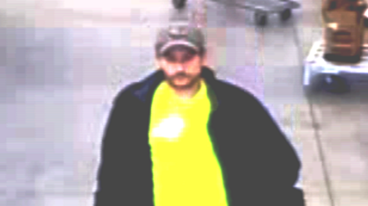 Deputies believe this man captured on surveillance video robbed a Walmart with a knife and a hatchet.