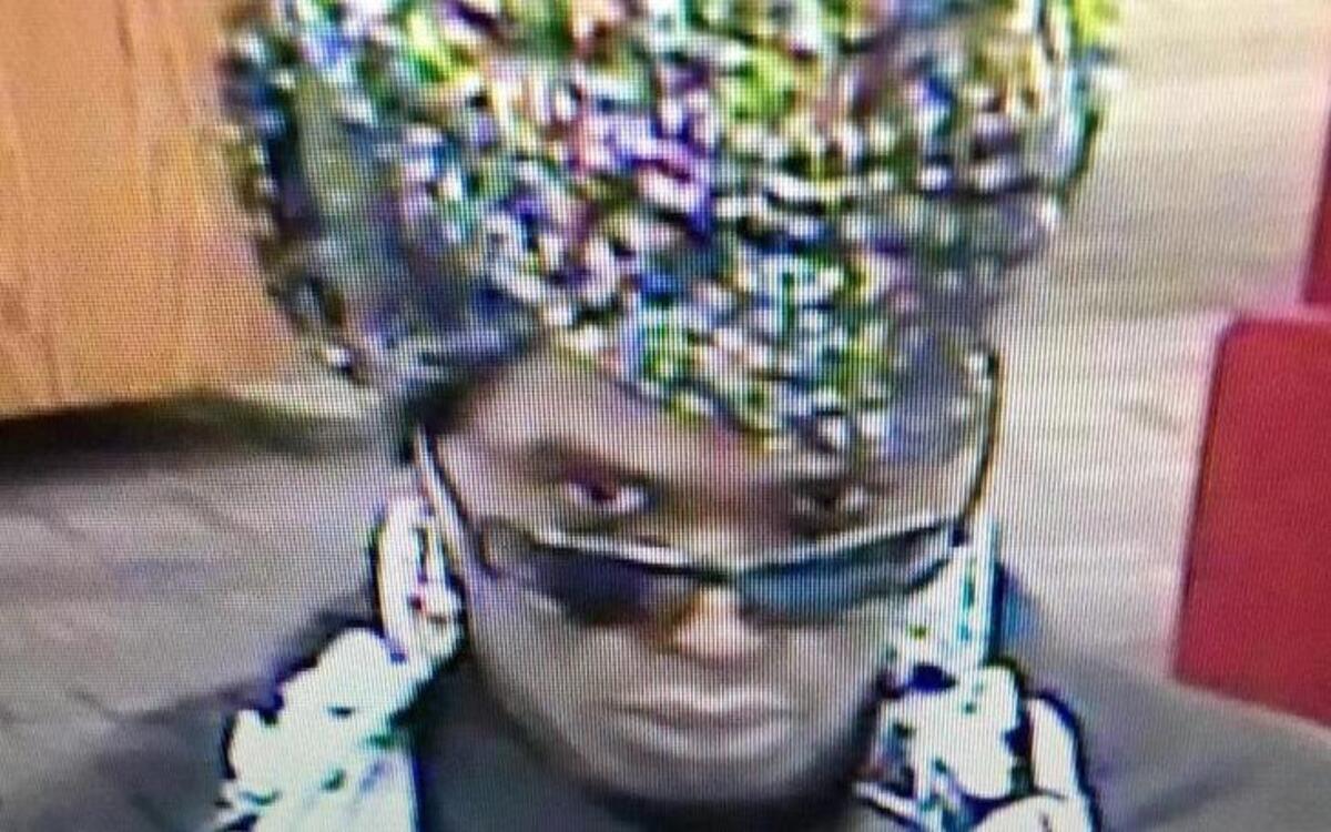 Surveillance cameras captured images of a suspect in a Bank of America robbery.