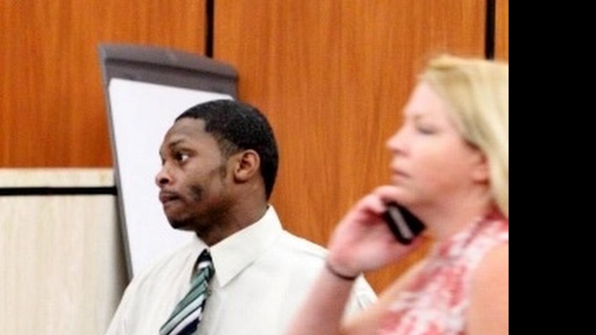 
Troy Stevens walks out of court with his attorney, Aimee Zmroczek, before court processing Tuesday. 

