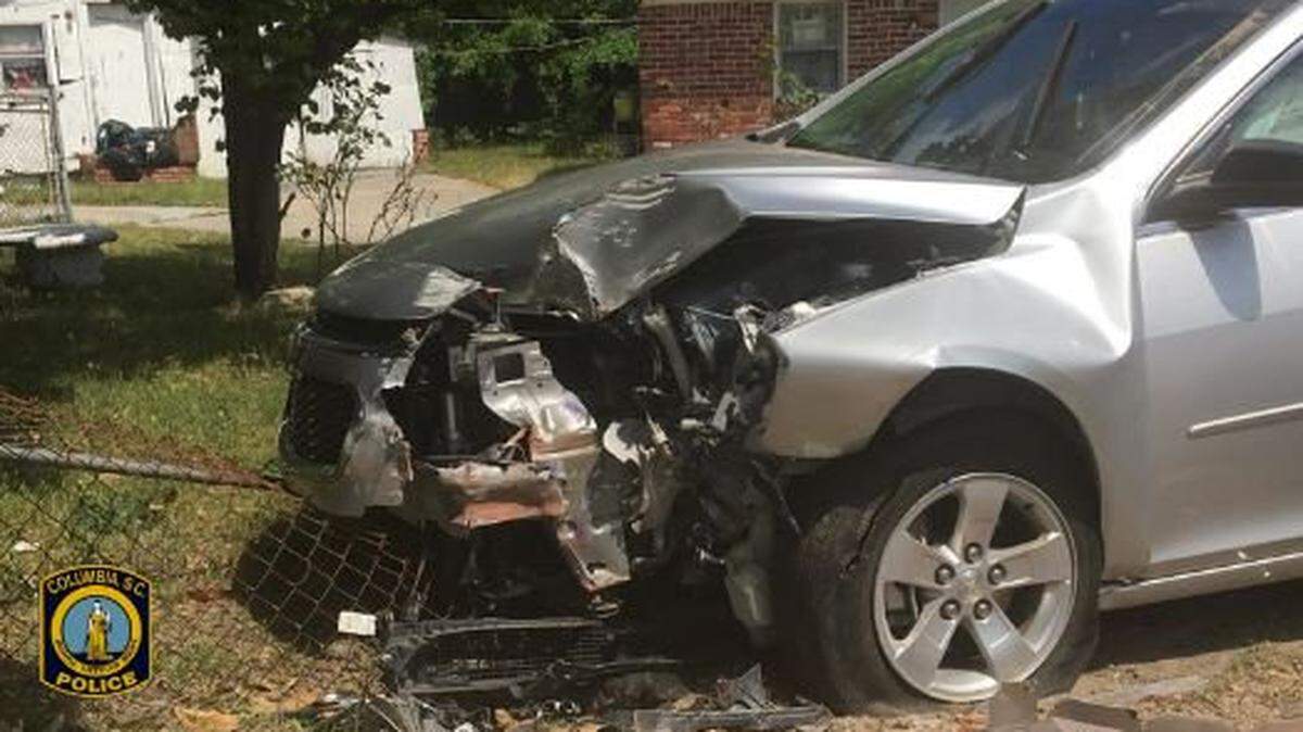 A teenager driving a car stolen during a Charlotte carjacking was arrested after plowing the car into some brick mailboxes during a pursuit in Columbia, police say.