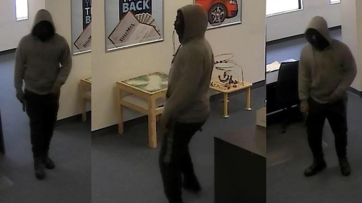 Surveillance photos the TitleMax in Camden at 1:25 p.m. May 25, 2017.