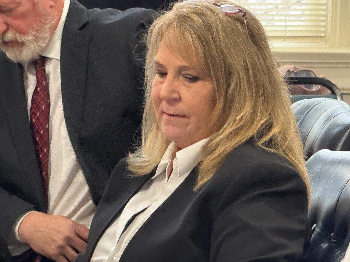 Becky Hill, former court clerk for Colleton County, sits at the defense table at a hearing in December at the Calhoun County courthouse.