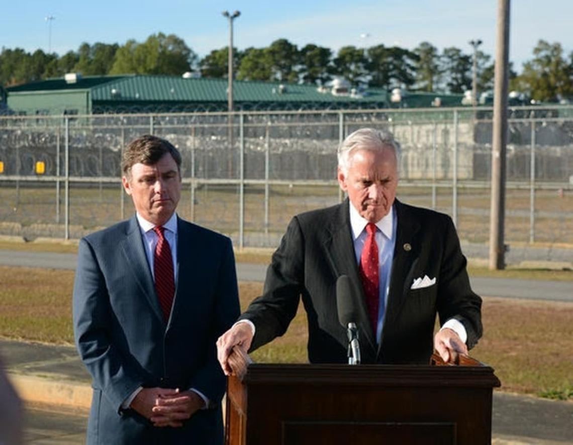 Bryan Stirling and Gov. Henry McMaster at a 2018 press conference.