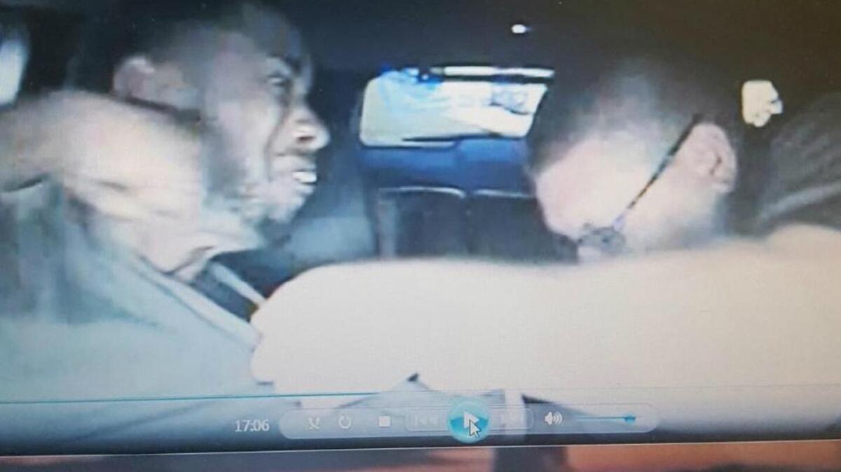 A screenshot of Rico Levern Ross, 32, struggling with a Kershaw County Sheriff’s deputy.