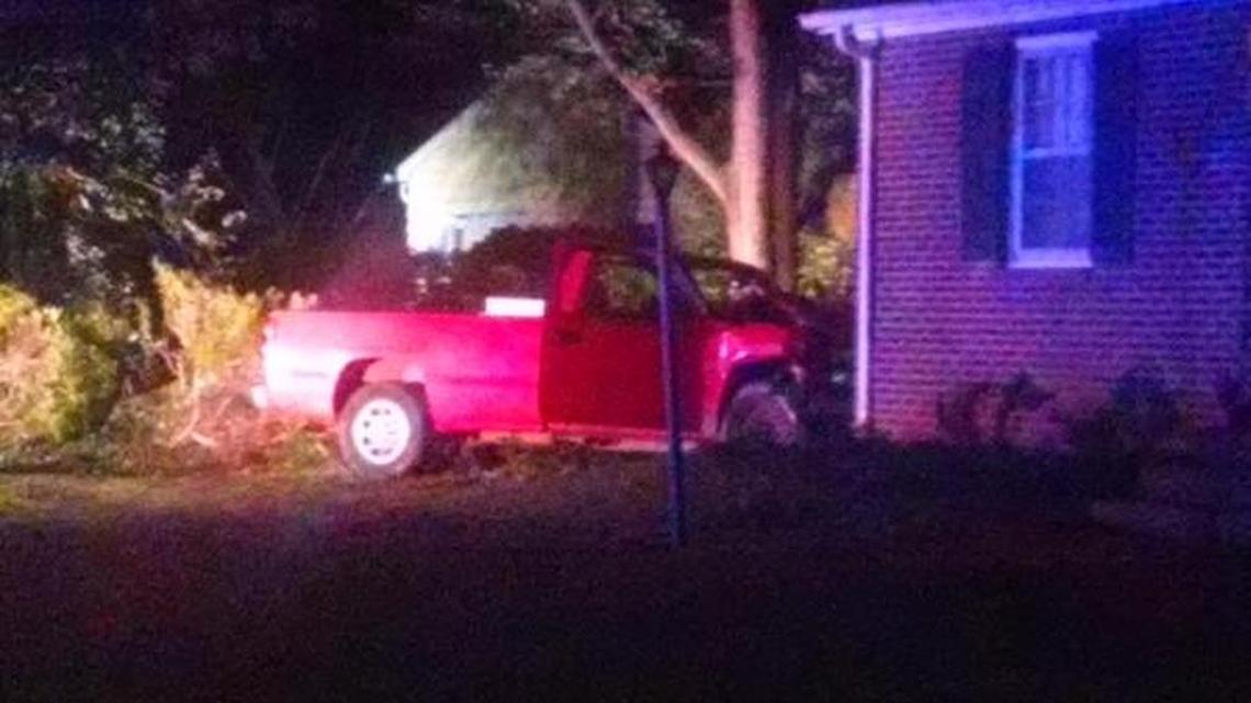 
A red pickup truck crashed into the side of a house on Evergreen Circle Sunday. The driver was flown to the hospital from the scene by helicopter.
