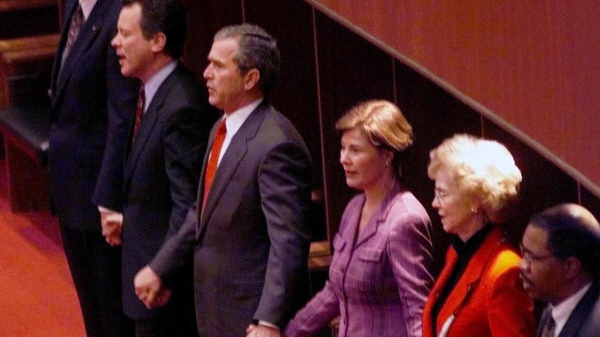 Then-GOP presidential candidate George W. Bush, center, and his wife Laura join hands as they sing at Bob Jones University during a 2000 campaign stop there. Among others shown are, from left, Bob Jones III; former South Carolina Gov. David Beasley; and the Bushes. It was Bush’s visit 15 years ago that triggered a wave of political attacks against the school over its policies banning interracial dating and its branding of Catholicism as a “satanic counterfeit.”