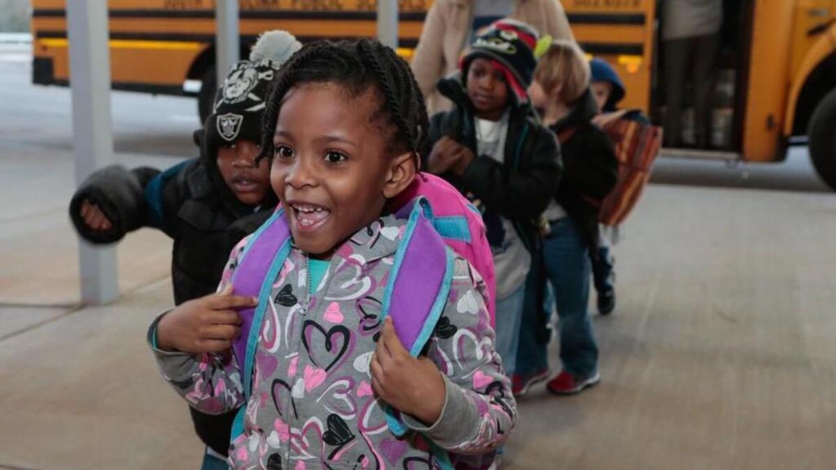 Riverview Elementary students arrive for school in January 2015.