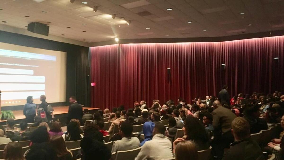 A racially diverse crowd of about 300 students packed into a theater in USC’s student union Thursday night to express their anger about a recent incident of racist flyers being posted on campus.