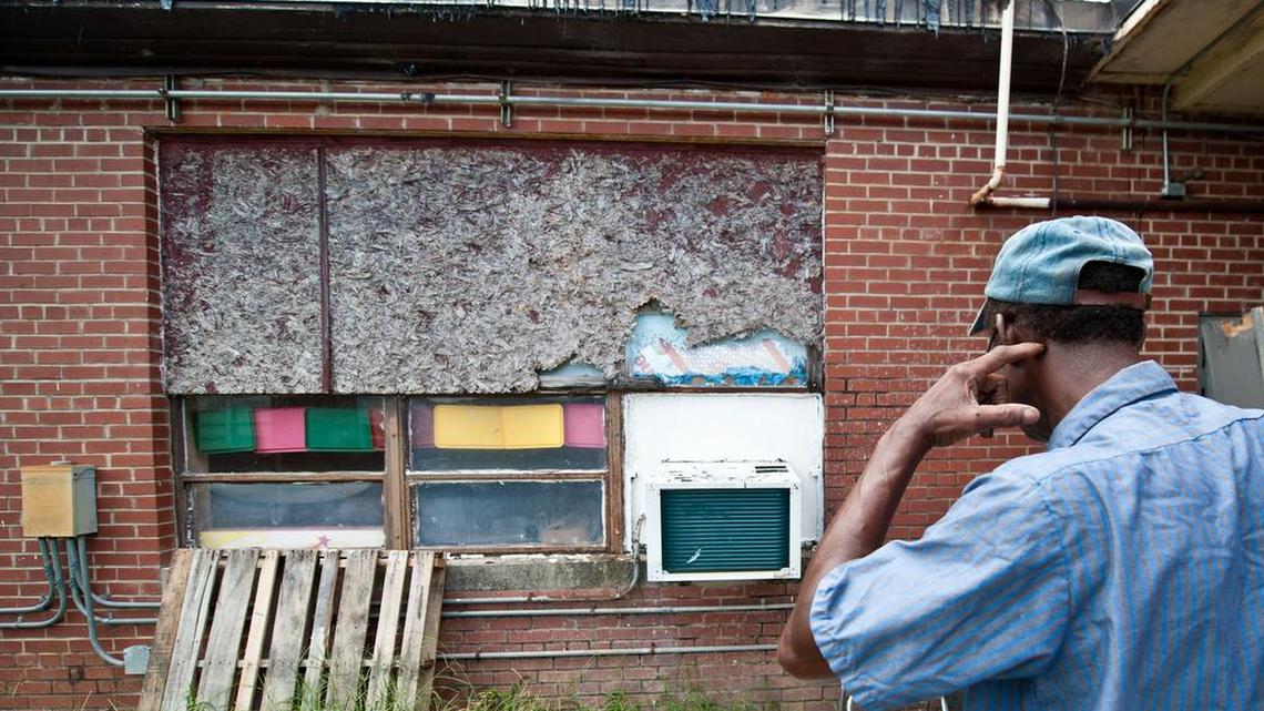 In 2012, The State accompanied a group of USC studentsto Denmark-Olar Elementary School in Bamberg where they weatherized two portable classrooms in an effort to help the "corridor of shame" school become more energy efficient and potentially save some money. Here, Maintenance Supervisor, Jimmie Shepherd, examines particle board that was put in place to block sun from coming into, and heating up, classrooms.