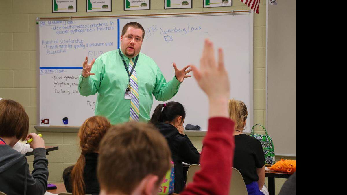 
Albert Robertson teaches the history of the Holocaust to his social studies class at Meadow Glen Middle School in Lexington. Robertson is one of five finalists for S.C. Teacher of the Year. 
