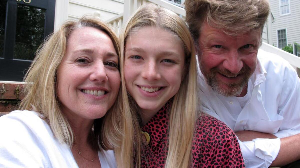 Hunter Schafer with parents Katy and Mac at their Raleigh home on Friday. The 17-year-old transgender youth is a plaintiff in a lawsuit against North Carolina's HB 2.