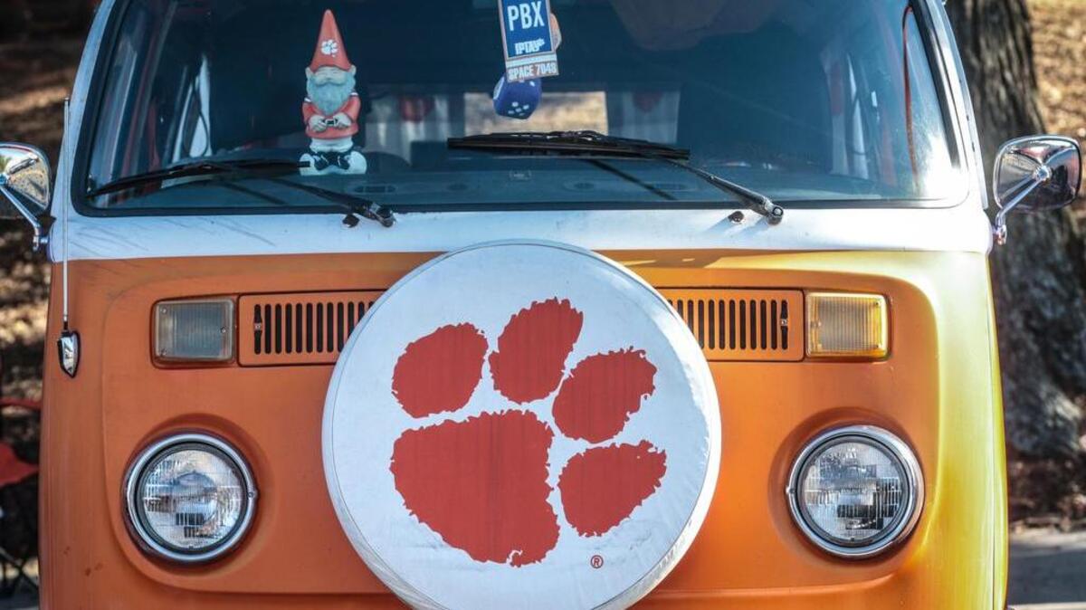 A Volkswagen van decked out in Clemson memorabilia.