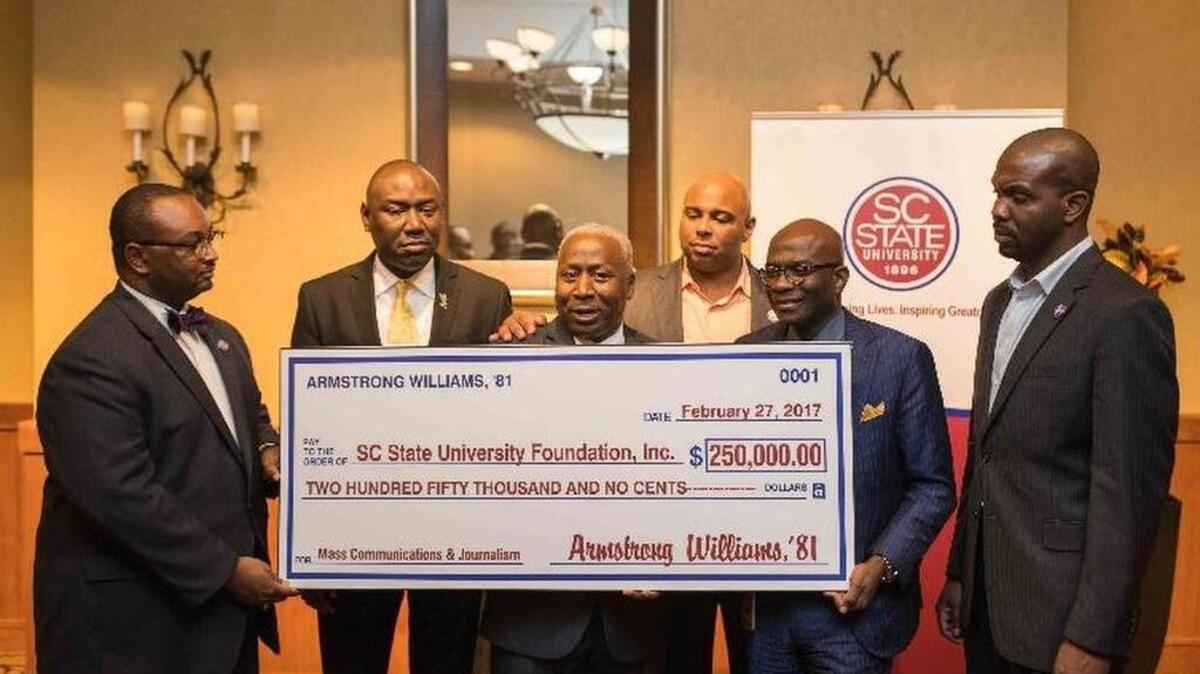 FILE: S.C. State president James E. Clark, center, expresses appreciation to alumnus Armstrong Williams, ’81, second from right, for his contribution to S.C. State. The two are joined by, Associate Vice President for Institutional Advancement and executive director of the S.C. State Foundation A.L. Fleming; Attorney Benjamin Crump; alumni and foundation board of directors, Terrance Head and Ogunna Njoku.