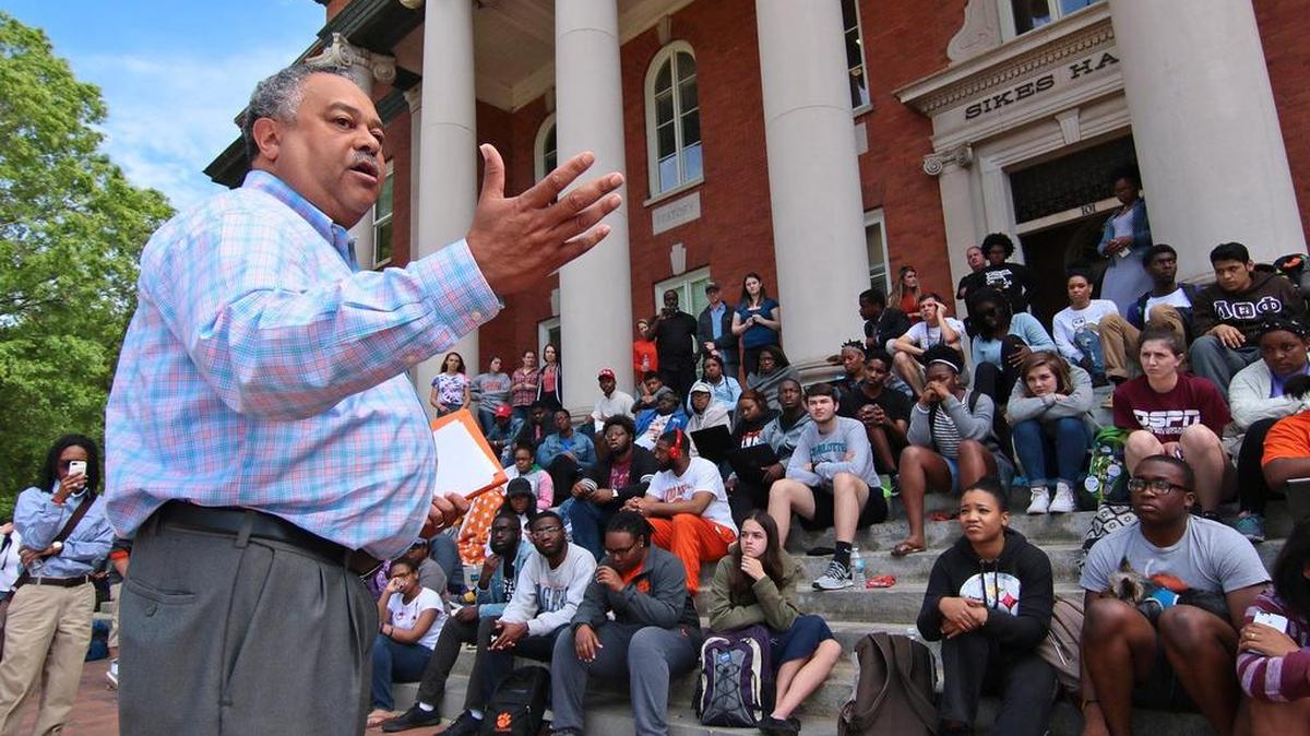 Max Allen, chief of staff at Clemson University, acknowledges the statement from each of the students from The Clemson Five, who spoke after ending a sit-in inside Sikes Hall administration building Friday in Clemson.