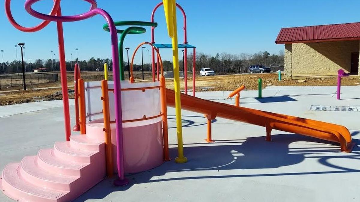 A splash pad is one feature at a new park near Chapin.