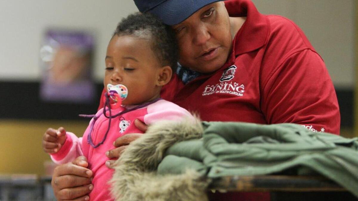 
A Red Cross Shelter is set up at Lower Richland High School. Cheryl Miller and her four grandchildren have stayed at the school since Sunday afternoon when their apartment flooded. 
