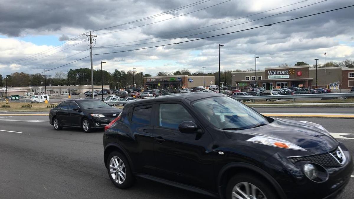 Cayce officials want to put landscaped medians on a mile of Knox Abbott Drive, ending by a shopping center with a Wal-Mart supermarket.