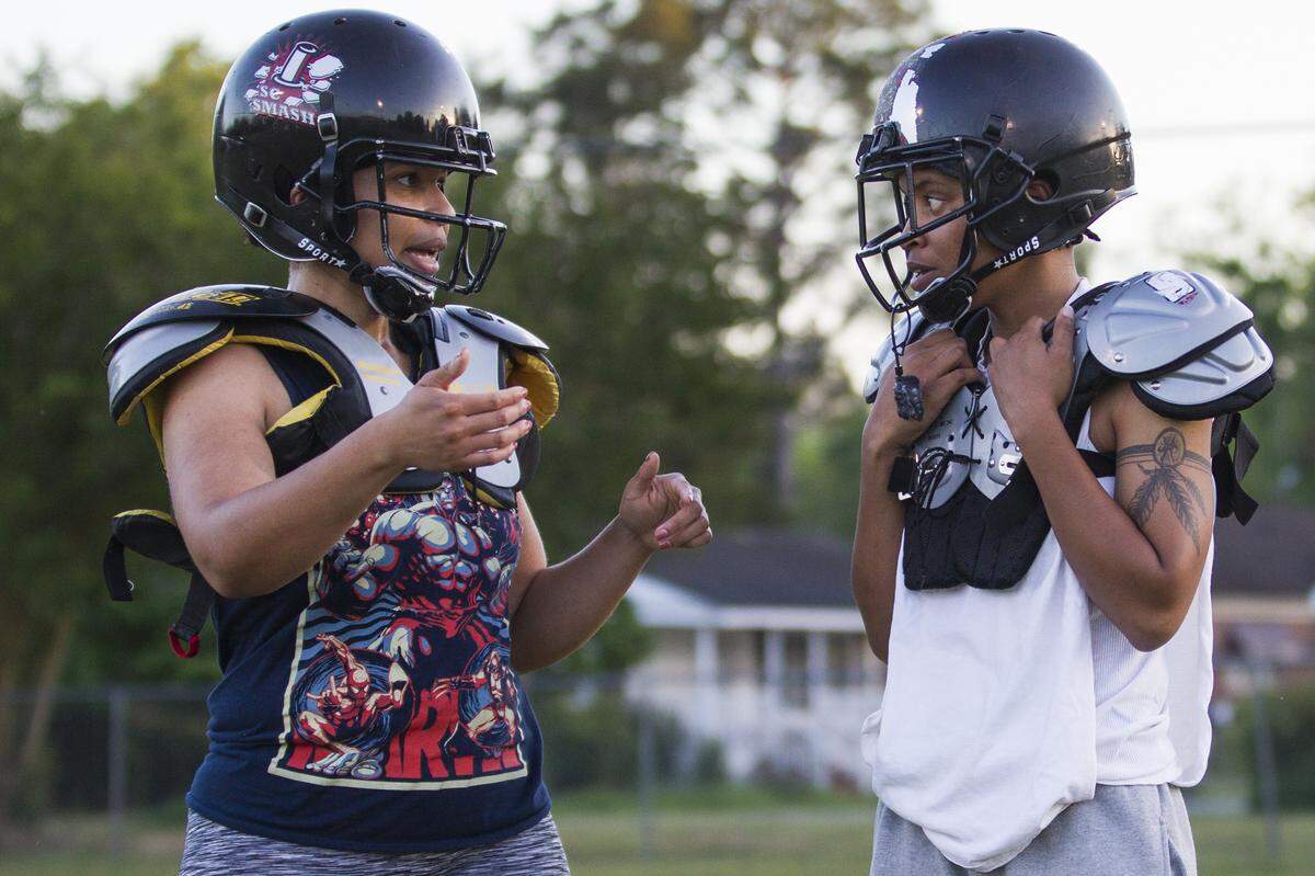 S.C. Smash’s Adriana Smith, left, talks to Princess Brown about her route during practice in Columbia, SC. The team practices three times a week in the afternoon to work around the players schedules.