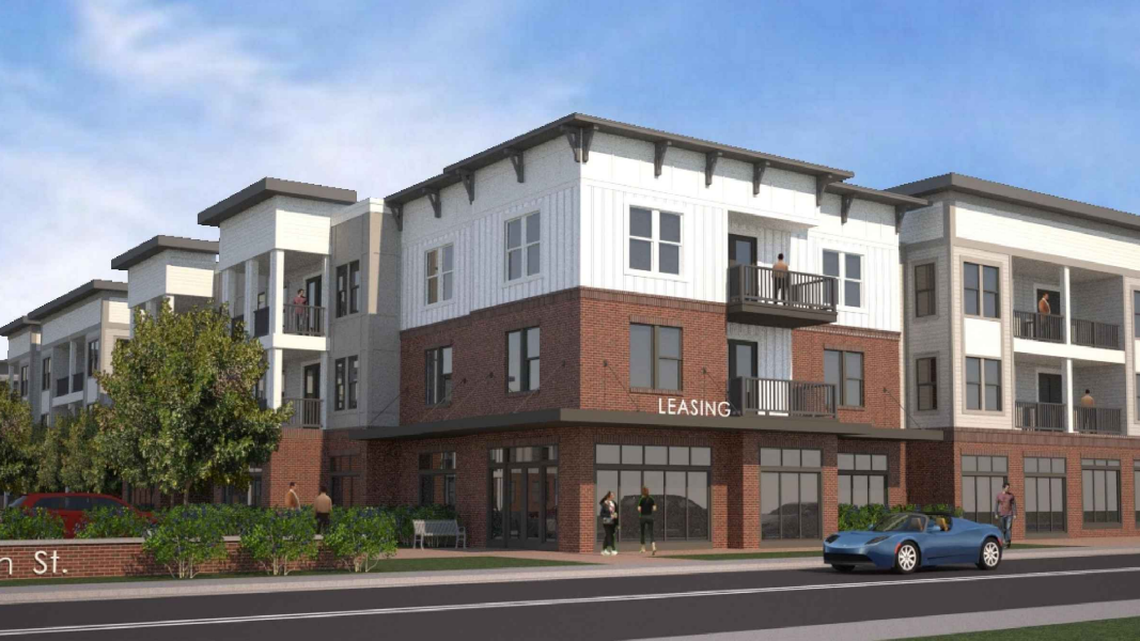 Plans for a new luxury apartment complex at the former Jim Moore Cadillac dealership are back on the table, after being stalled since 2021.