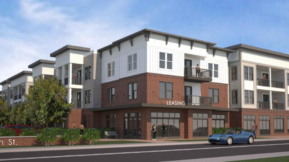 Plans for a new luxury apartment complex at the former Jim Moore Cadillac dealership are back on the table, after being stalled since 2021.