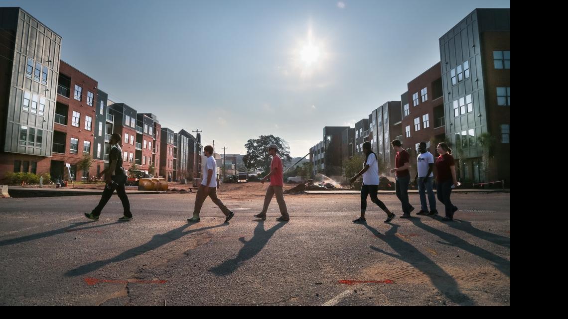 
Workers are finishing the construction of Greene Crossing student housing project on Pulaski Street in time for the influx of 1,600 students for the beginning of school.
