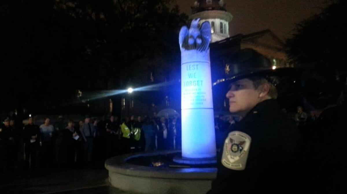 Officers from agencies around South Carolina gathered to honor their fallen brothers and sisters at the State House on Tuesday night.