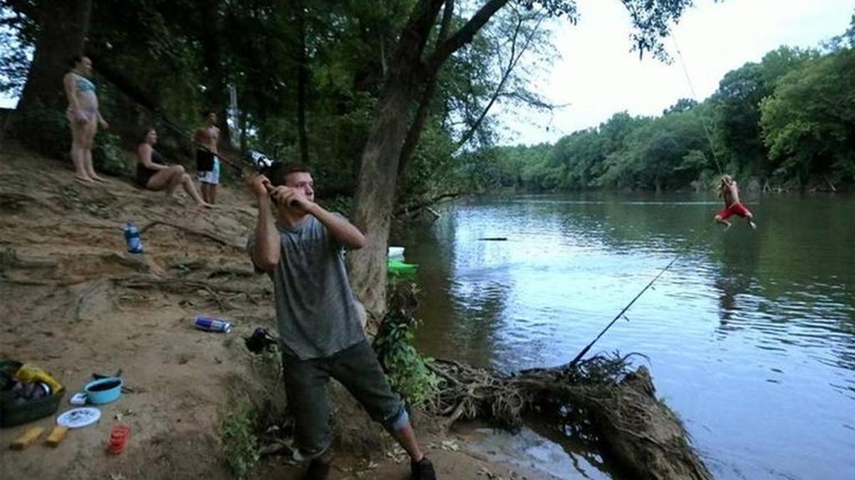FILE PHOTO: Elliya Shapoval and his friends spend time, in June 2017, on the Saluda River across from Saluda Shoals park where DHEC warned about high bacteria levels occuring. Shapoval said they didn't know about the warning.