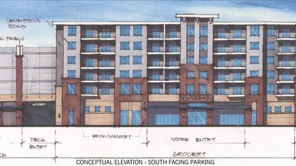A rendering of a possible development at Huger and Hampton streets downtown that would include a supermarket with apartments above it.