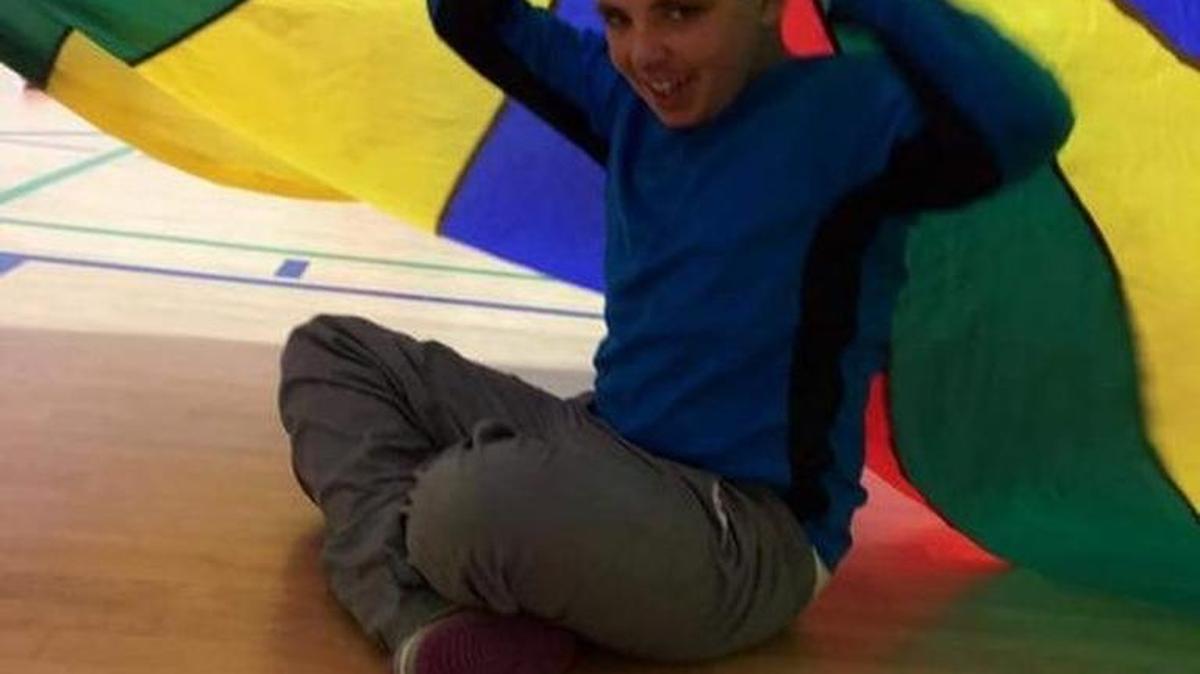 An autistic 20-year-old with the mind of a child, pictured before losing 40 pounds while in the care of a facility in Florence.