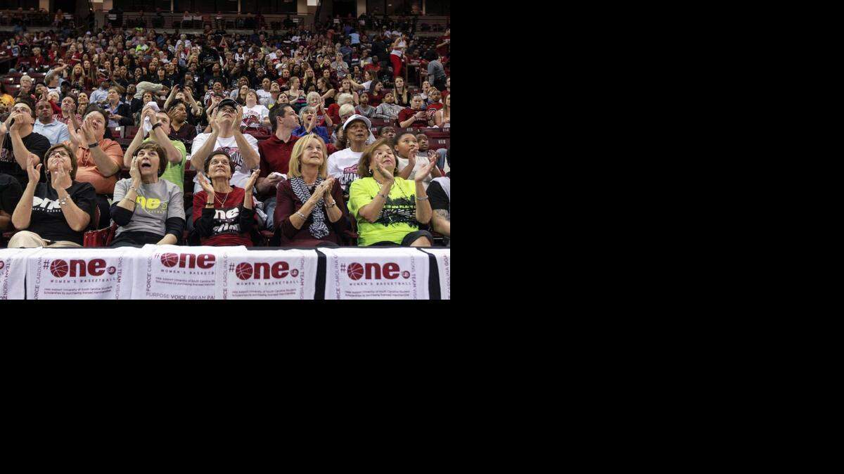 
USC fans watch the NCAA women’s tournament selection show as they wait for the team’s name to be announced during a celebration at the Colonial Life Arena earlier this month.
