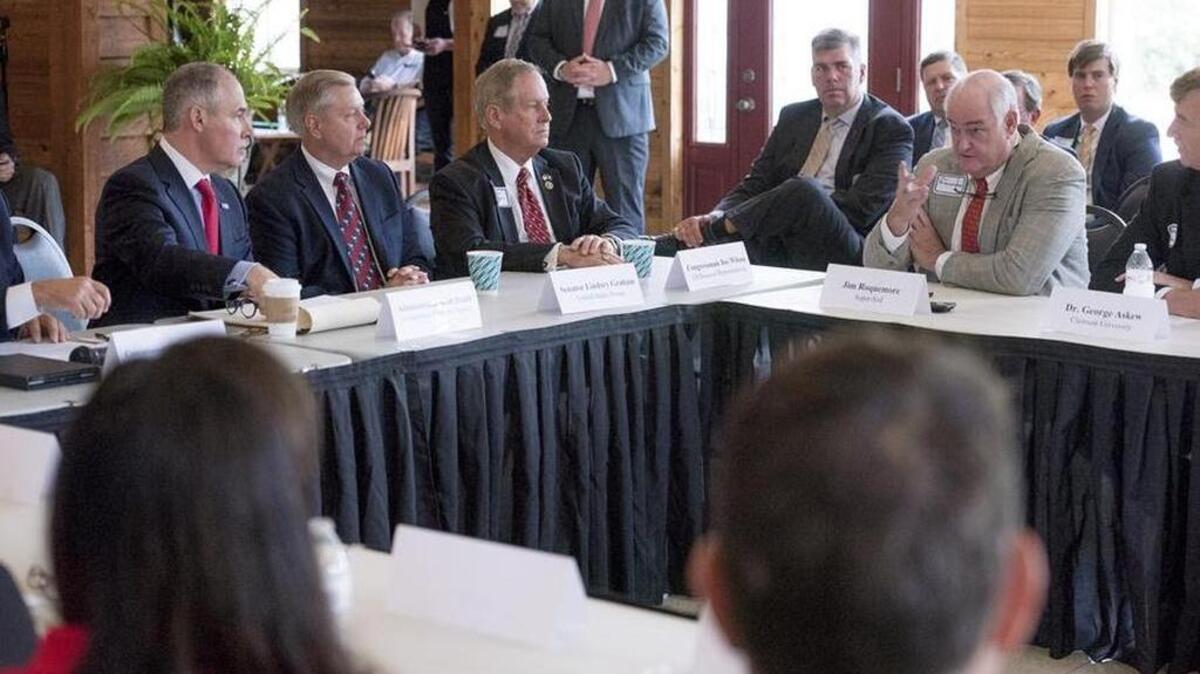 US EPA Administrator Scott Pruitt, far left, meets in Orangeburg Counnty with business leaders and farmers about scrapping a wetlands rule that environmentalists say will protect wildlife and water quality.