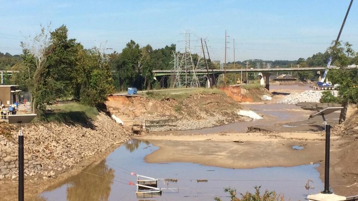 
Work continued Thursday at the Columbia Canal, focusing largely on the boulder dam in the background. The dam will become a second reservoir to sustain the nearby water treatment plant.
