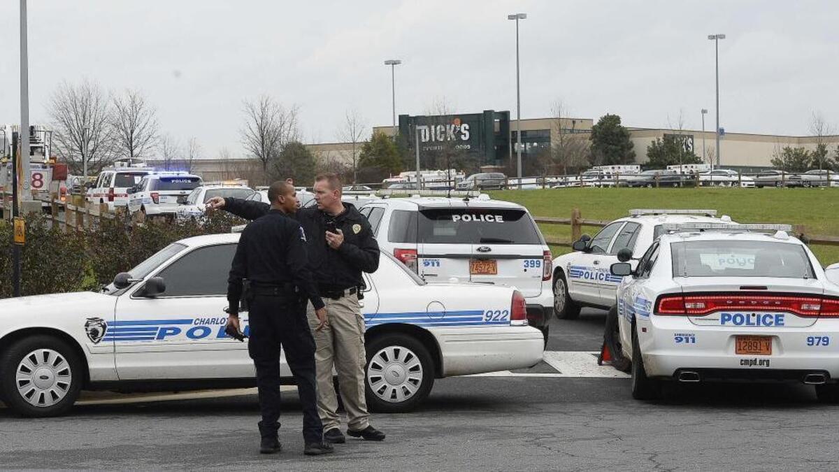 Police on the scene at Northlake Mall where a fatal shooting took place causing the mall to be evacuated on Dec. 24, 2015.