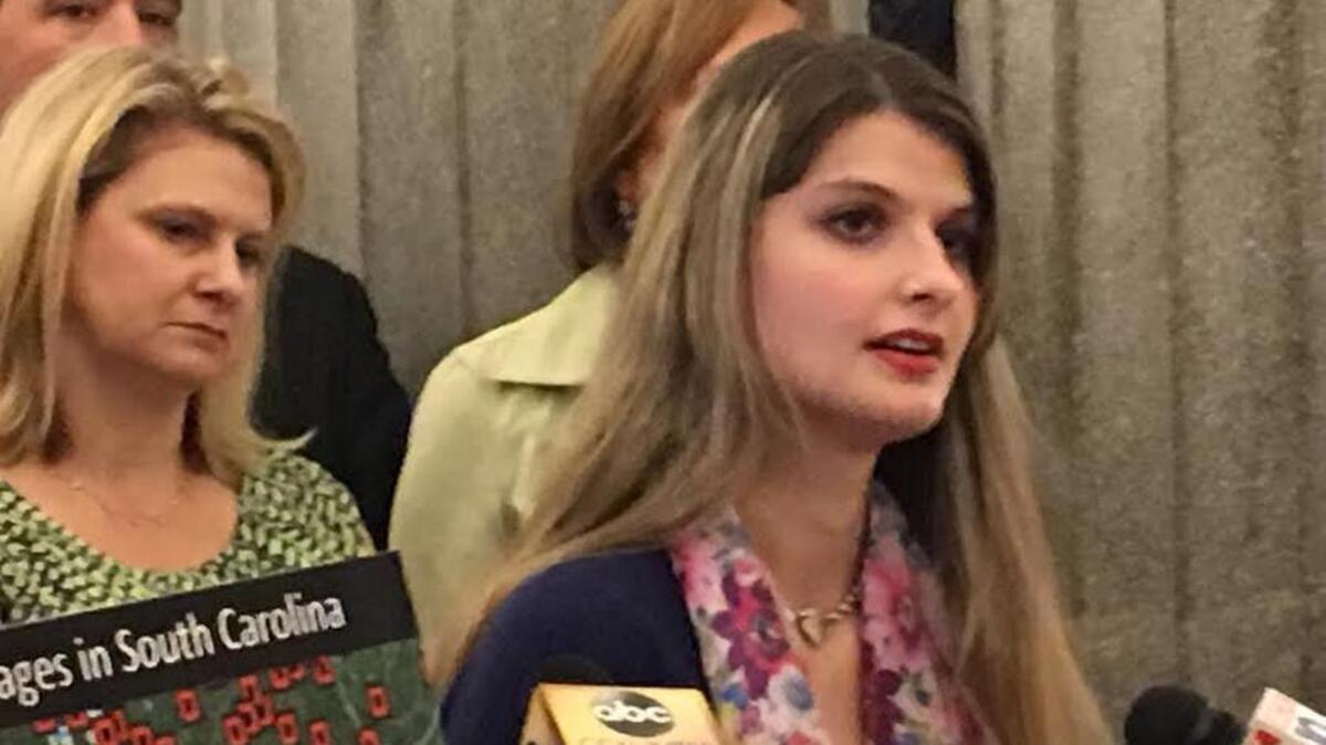 Alicia Kozakiewicz, an Internet predator victim, talks to lawmakers Thursday.