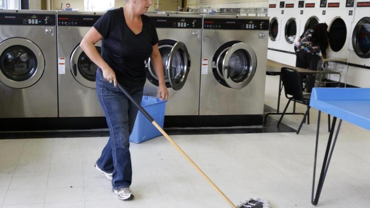 Veronica Erwin at work Wednesday at Kwik Klean Laundry in Rock Hill.