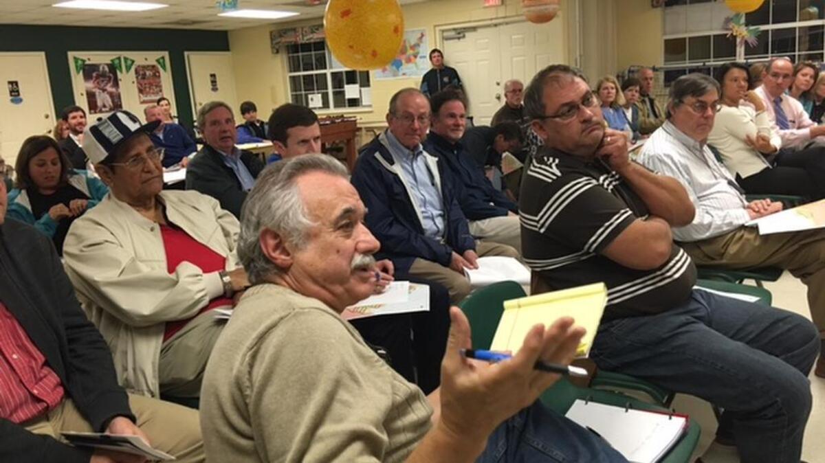 Flooded-out homeowner Di Giacomantonio questions officials.