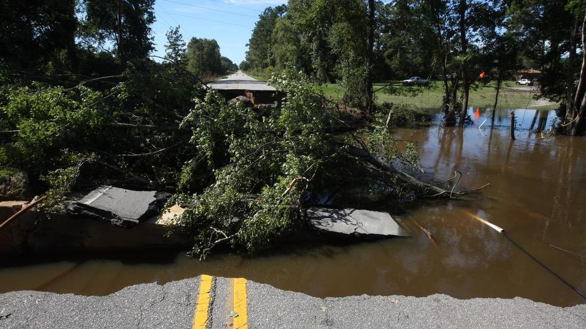 This file photo shows portions of Bluff Road washed out by the flooding in October 2015.