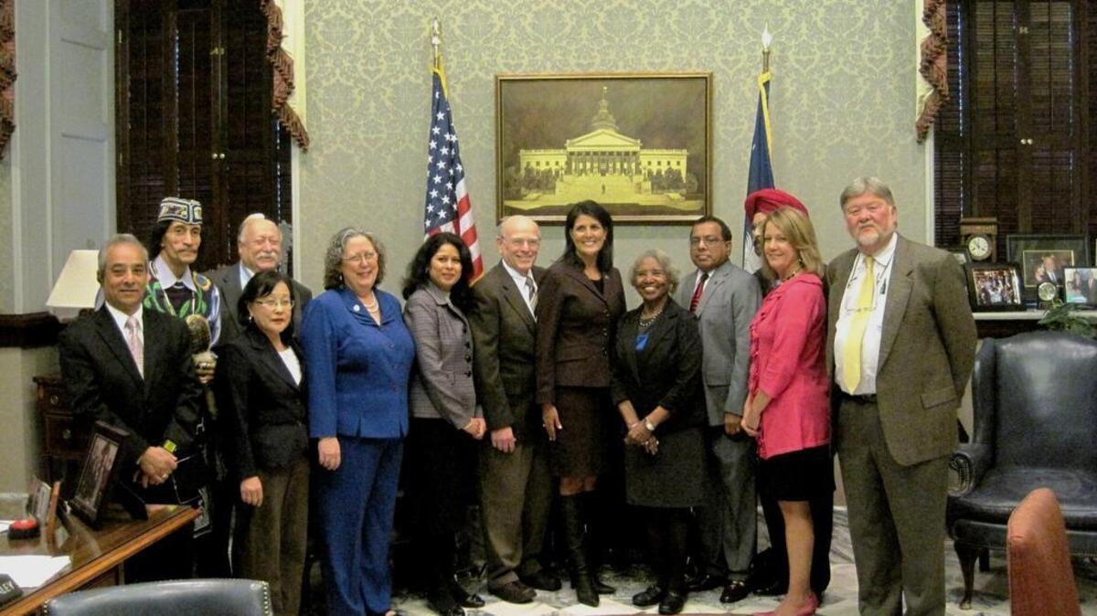 Gov. Nikki Haley stands with members of Interfaith Partners of South Carolina in 2014.