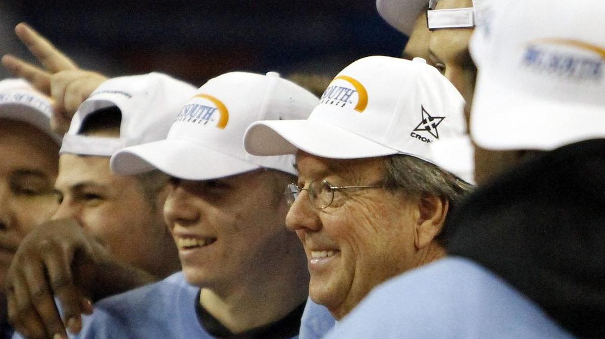
Coastal Carolina's Coach Cliff Ellis celebrates with players after beating Winthrop in the 2015 Big South Championship game. The team departs on their route to Cuba on Thursday, Aug. 6.
