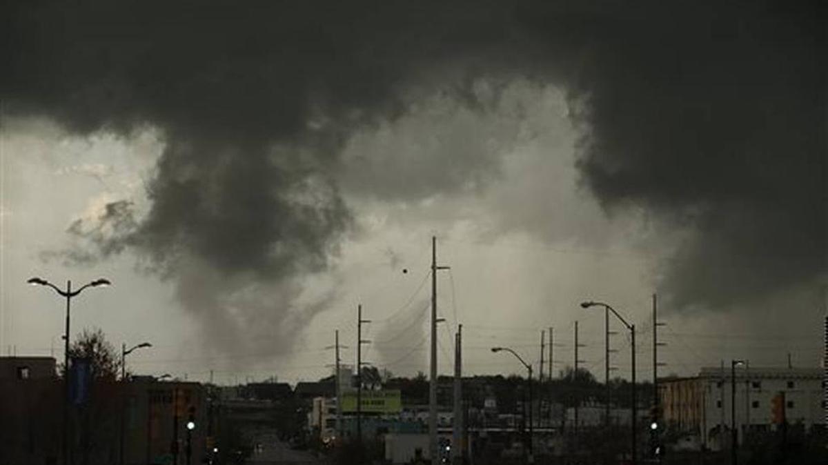 A storm passes over north Tulsa, Okla., Wednesday, March 30. Multiple people were injured and authorities were evaluating the damage in northeastern Oklahoma after severe storms spawned multiple tornado touchdowns Wednesday night, authorities said.