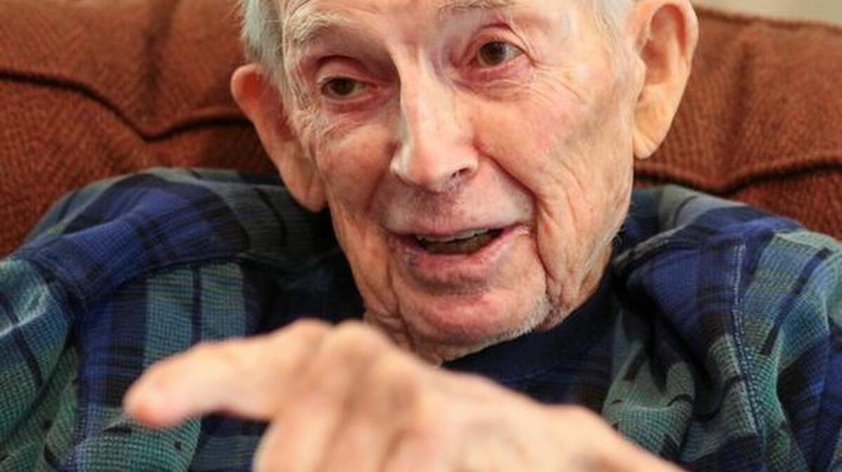 Ret. Maj. George Mitchell talks about close friends he met through years of military service at his home in Clemson. He will receive the Purple Heart on Sunday, 72 years after he was wounded in December 1944 at the Battle of Kesternich.