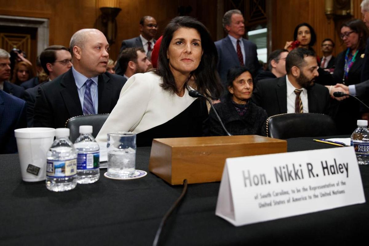 UN Ambassador-designate, South Carolina Gov. Nikki Haley, accompanied by her husband Michael, left, prepares to testify on Capitol Hill in Washington, Wednesday, at her confirmation hearing before the Senate Foreign Relations Committee.