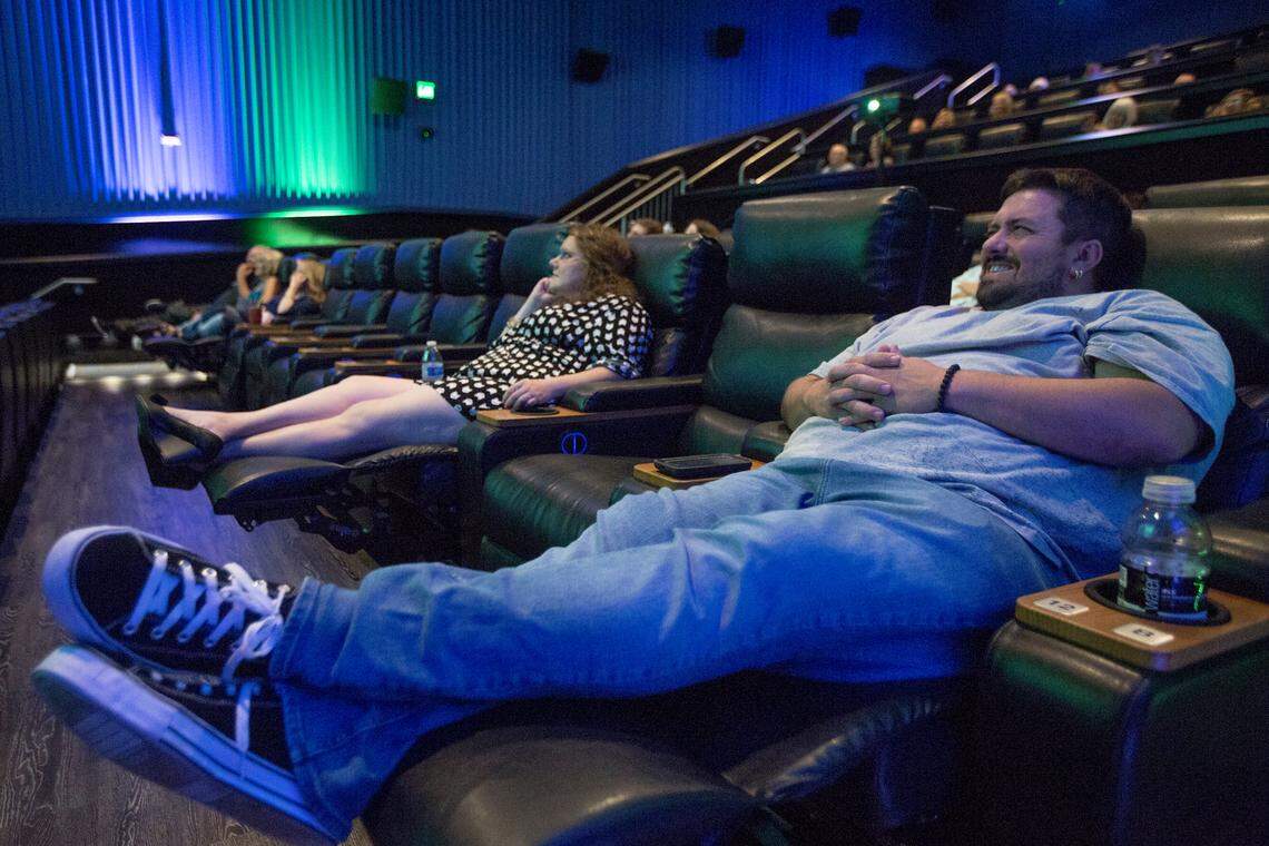 Chris Rao laughs during a sermon for OneLife Community Church as he leans back in his seat at Regal Columbiana Grande Stadium 14 in Columbia, SC. 