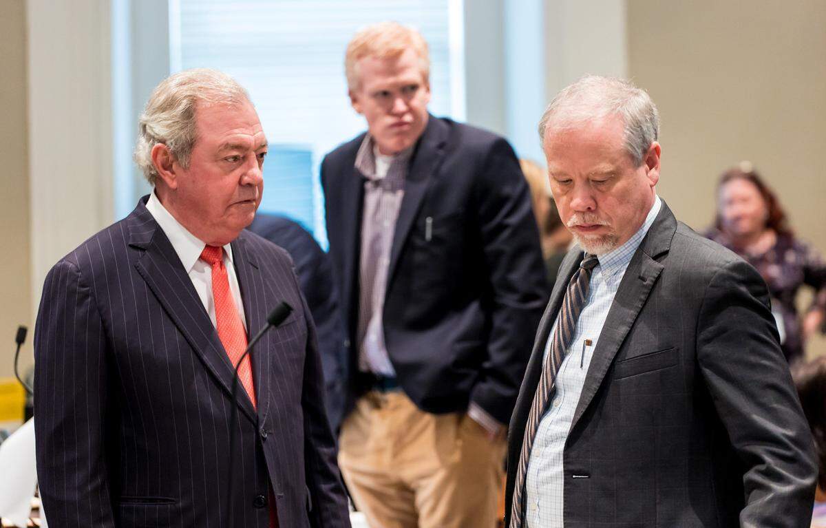 File photo of Alex Murdaugh, center, with his defense attorney Dick Harpootlian, right, and prosecutor Creighton Waters during Murdaugh’s double murder trial.