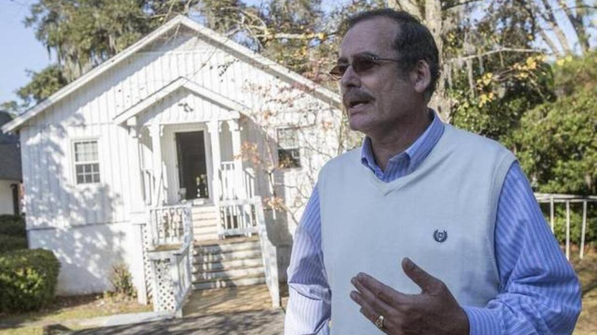 Father Reggie Corfield of St. Paul’s Anglican Church talks about the fire damage to the church’s administration building. The Dec. 10 fire was the latest in a series of expensive misfortunes at St. Paul’s, including the flooding in October, that has strained the church’s budget.