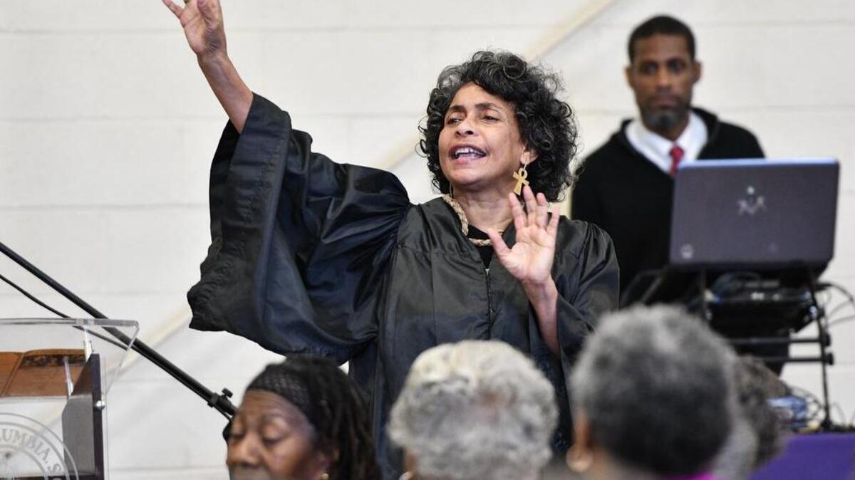Grandmaster Dr. Gemon “Adkins” Miller-Bey performs an emotional dance titled “A Moment in Black History” for Black History Extravaganza guests during the celebration held at Greenview Park.